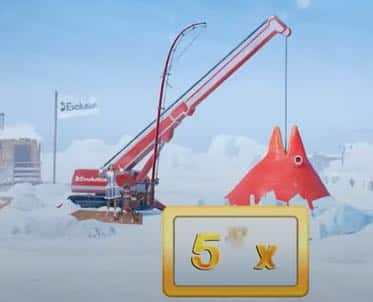 En lyftkran drar upp en stor röd fisk ur vattnet i bonusspelet i Ice Fishing