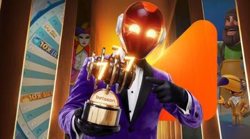 En maskerad casinokaraktär i lila smoking håller en pokal märkt Betsson, omgiven av slotspel och casinoteman – reklambild för priset Årets spel i Betssons omröstning.
